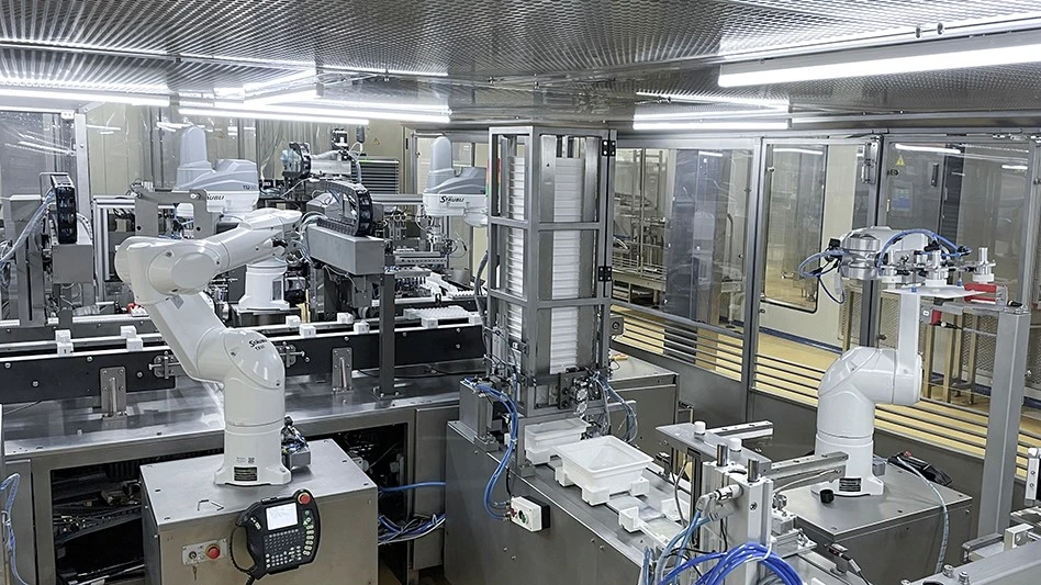 As part of a fully automated, GMP-compliant and hygienic production line, a pair of Stäubli SCARA robots picks and places pre-filled syringes on a conveyor.