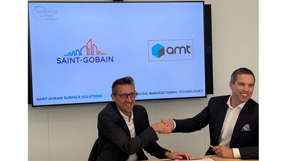 Signing the agreement (L-R) – Laurent Tellier (Saint-Gobain Surface Solutions CEO), and Joseph Crabtree (AMT CEO and Founder)